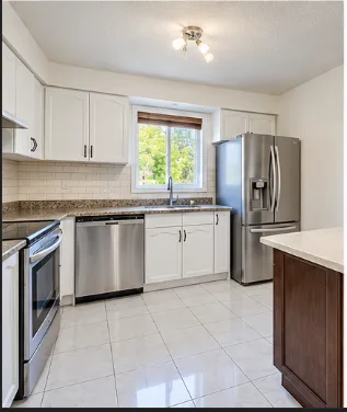 Bright and spacious upper-level home in a great Tecumseh location.